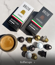 Brizio koffiecups en espresso op tafel bij blog over Italiaanse koffies